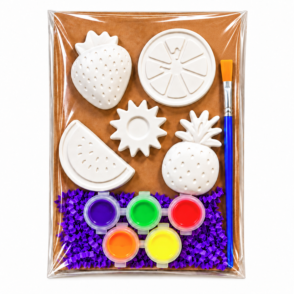 Fruit-themed plaster painting kit with strawberry, orange slice, watermelon, pineapple, and sun shapes, five paint colors, and a paintbrush.