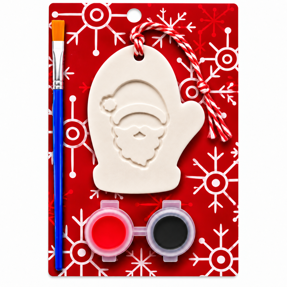 Christmas Santa mitten plaster craft kit on a red patterned backing card, including a white mitten-shaped ornament, a blue paintbrush, red and black paint pots, and a red-and-white striped hanging string.
