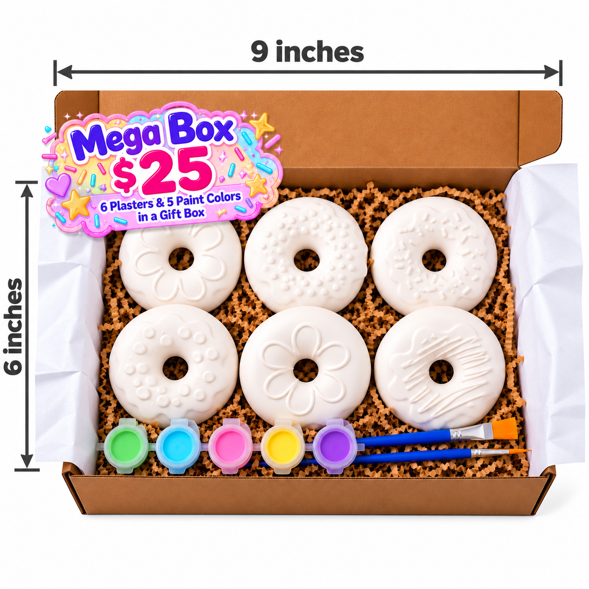 Donut Mega Box with six plaster donuts, five paint colors and two brushes in a gift box measuring 9 by 6 inches.