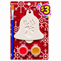 Christmas bell plaster ornament kit with reindeer design, red and gold paints and a paintbrush on a red snowflake card.
